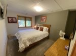 Lower level bedroom 3 with queen bed